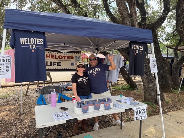 The Helotes Life vendor booth under the oaks at Rocklobster Fest 2026, Josabi's, Helotes, Texas